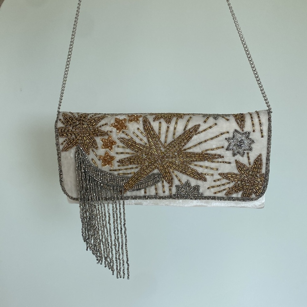 From St. Xavier Night Sky Foldover Clutch